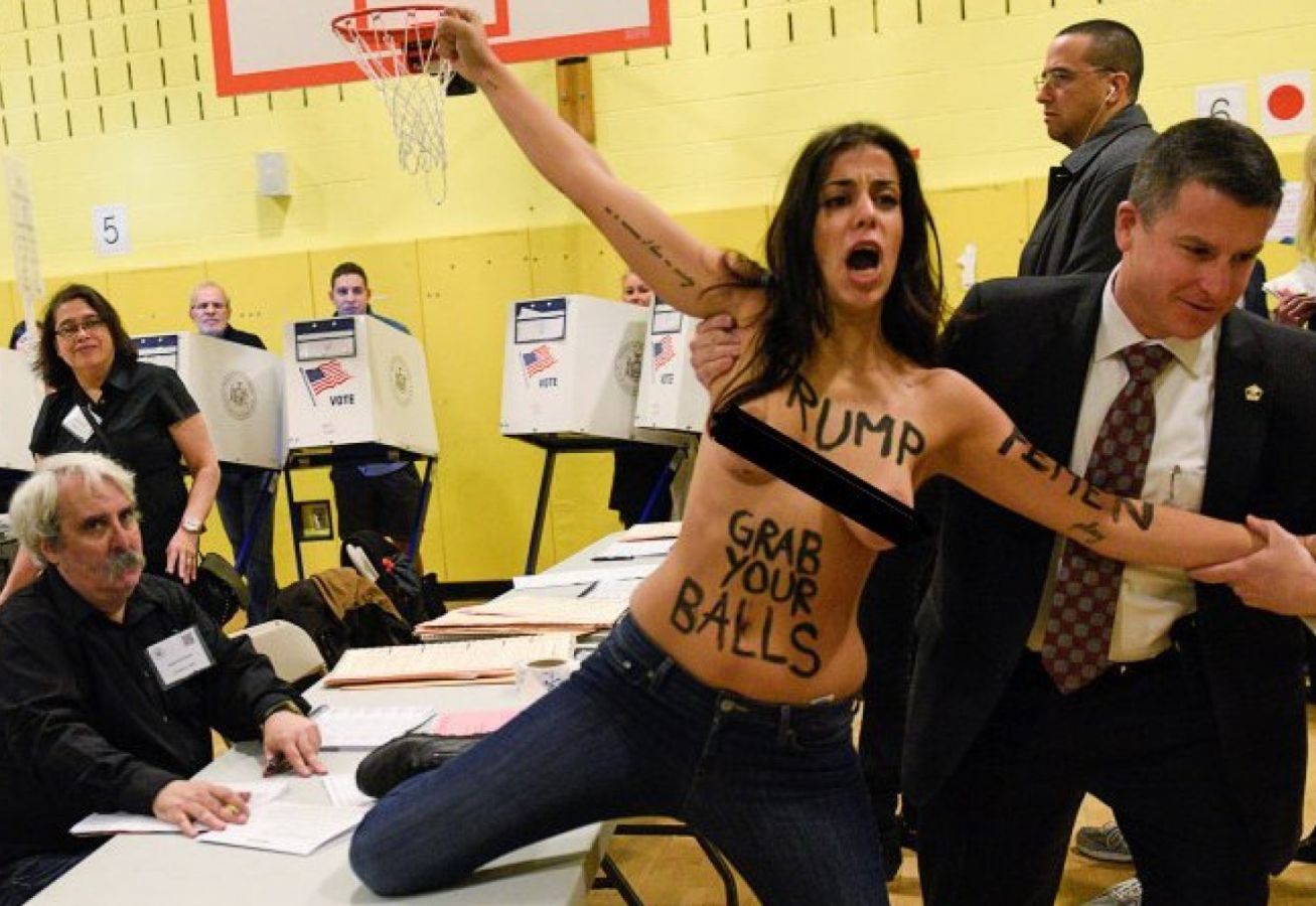 Активистки Femen разделись на избирательном участке Трампа