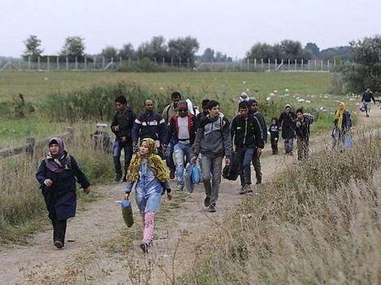 Германия: Евросоюз распределит беженцев между своими странами